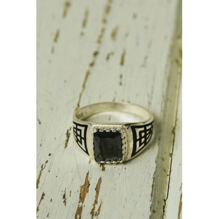 Antique silver ring with geometric design and black stone